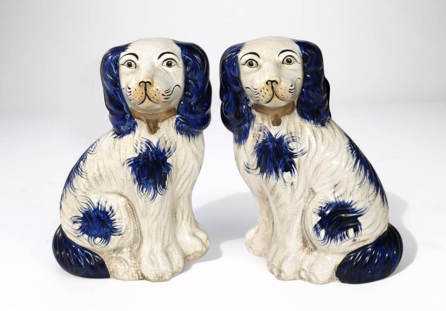Pair of English Chinoiserie Style Blue and White Ceramic Staffordshire Dog